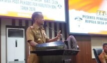 : Bupati Bone saat memberikan sambutan sekaligus membuka secara resmi kegiatan Uji Penilaian Kompetensi bagi Bakal Calon Kepala Desa Pergantian Antar Waktu (PAW) Kabupaten Bone Tahun 2026 di Gedung PKK Watampone, Senin (4/5/2026).